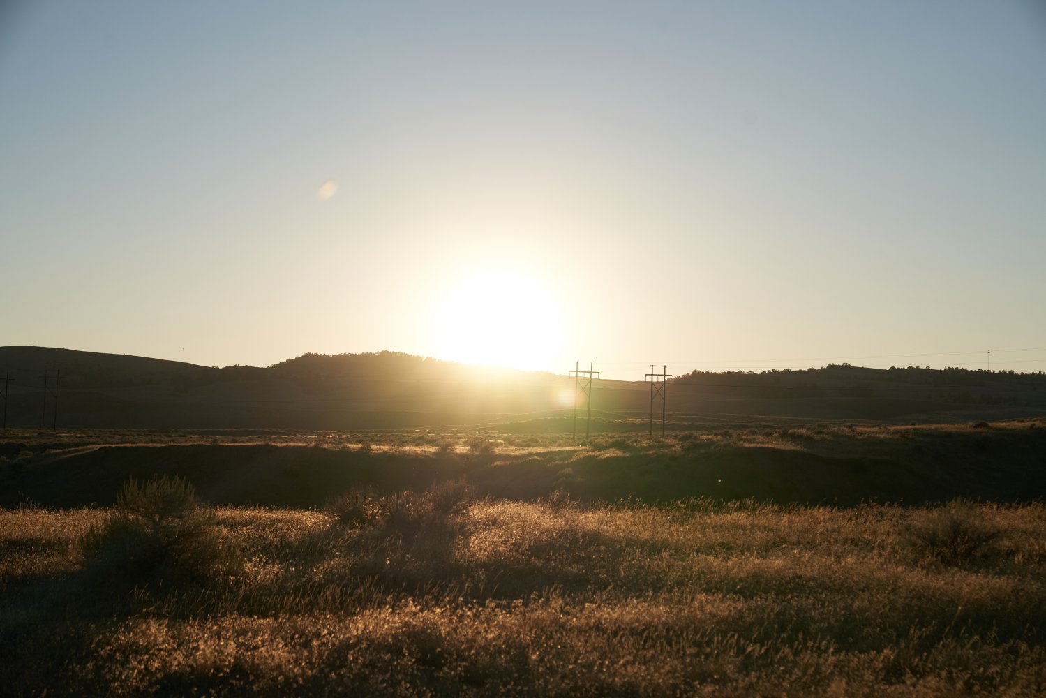 Sunset light glows over Wyoming’s lush, open terrain.